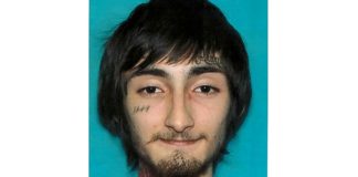 July 4 Gunman Charged With Seven Counts Of Murder